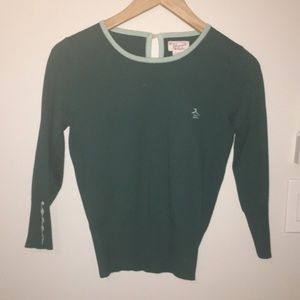 blue-green penguin sweater
